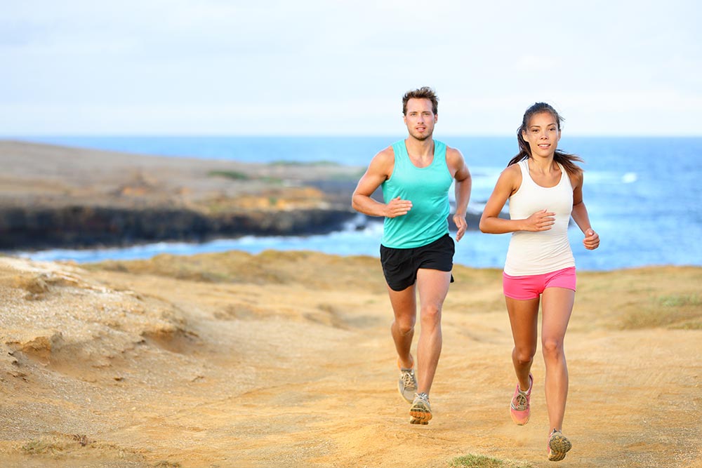 anaheimlighthouse-how-do-i-live-with-a-recovering-addict-article-photo-sports-couple-jogging-for-fitness-running-in-beautiful-landscape-nature-outdoors-young-female-and-177468638