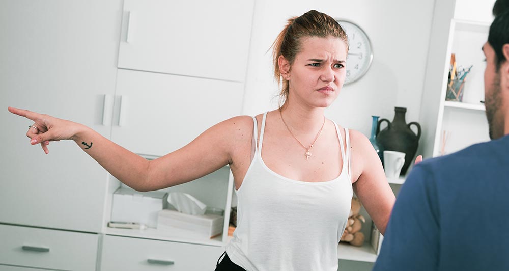 lighthousetreatment-how-long-do-opiates-stay-in-your-system-article-photo-irritated-young-woman-emotionally-gesturing-in-quarrel-with-man-748745293
