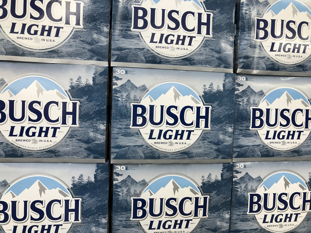 Boxes of blue Busch Light beer stacked together