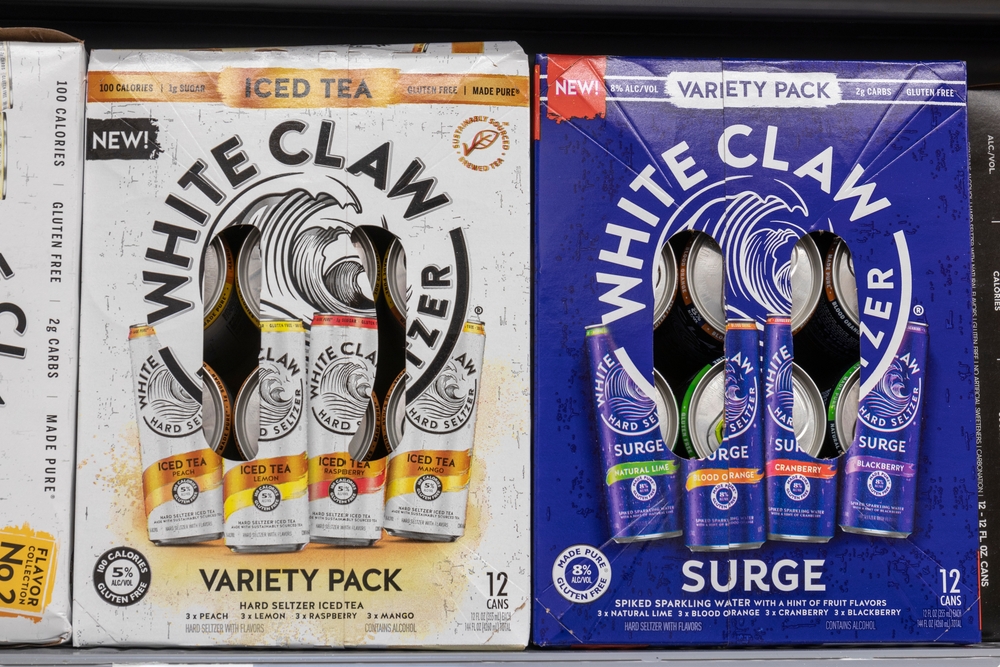 Two boxes of White Claw Surge and Iced Tea 