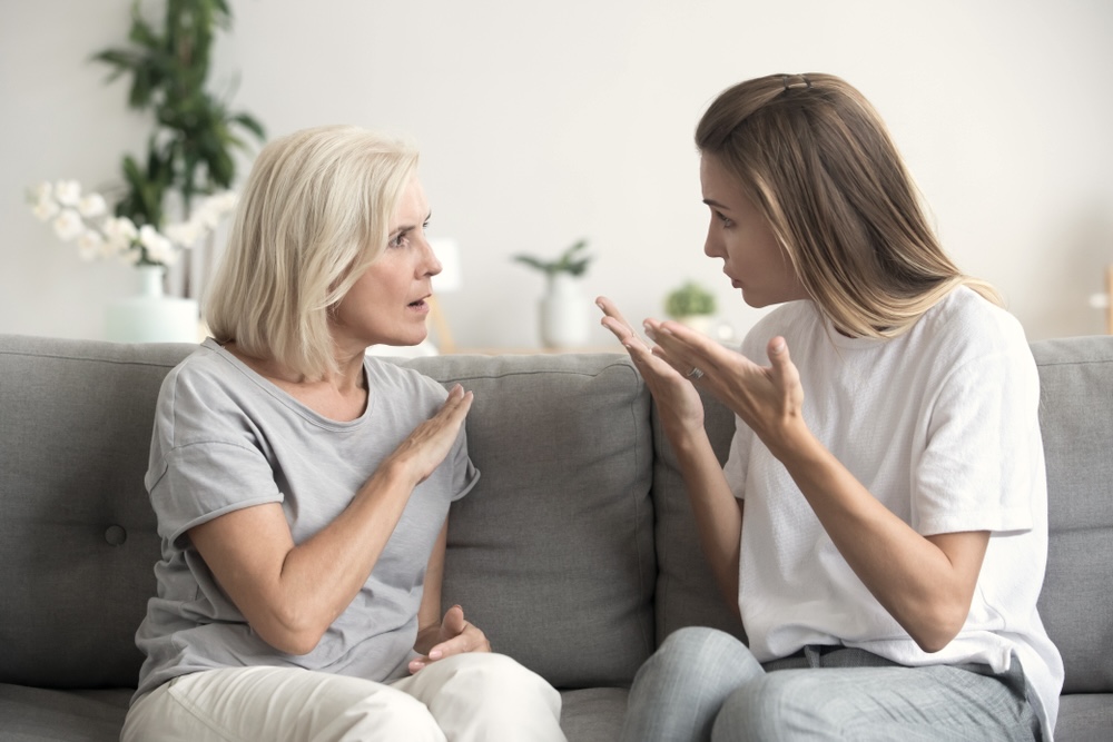 Mother and daughter arguing about daughter’s past addiction