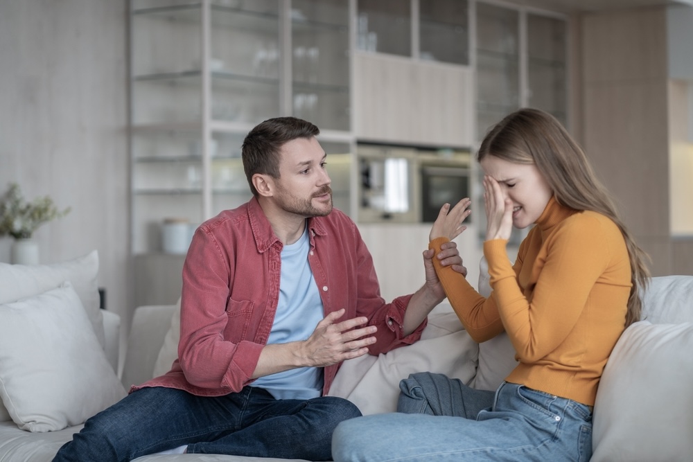 Male comforting his female partner having mood swings due to cocaine use